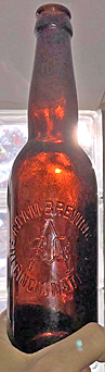 THE ADAM BREWING COMPANY EMBOSSED BEER BOTTLE